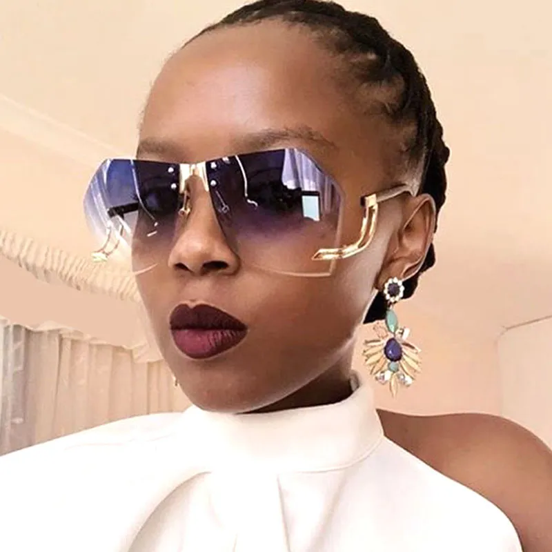 Women Fashion Irregular Lens Frameless Sunglasses PC Metal