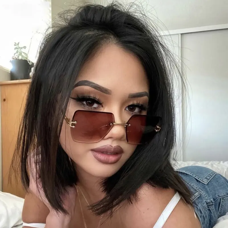 Fashion Big Rimless Design Metal Sunglasses for Women