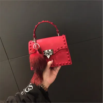 Women Fashion Metal Decorative Rivet Handle Square Shoulder Bag with PVC Material