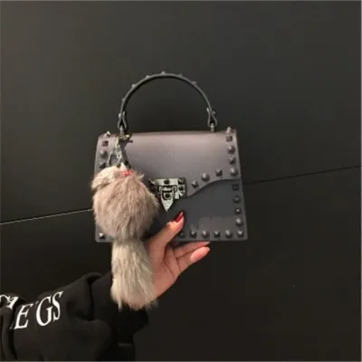 Women Fashion Metal Decorative Rivet Handle Square Shoulder Bag with PVC Material