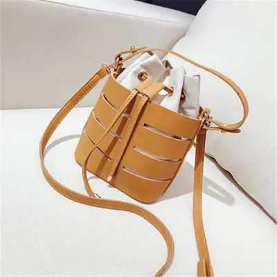 Women's Fashion Hollow Out PU Leather Bucket Crossbody Bag - Solid Color