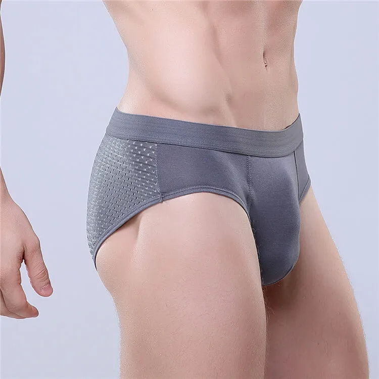 L-3XL Men Sexy Solid Color Hollow Out Briefs with U Convex Design