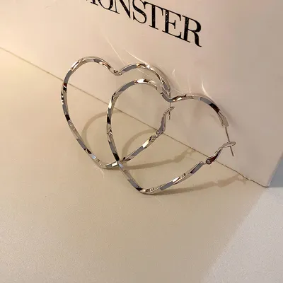 Exaggerated Heart-shaped Twisted Hollow Design Alloy Hoop Earrings