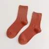 A Pair Of Orange And Red