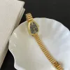 Gold With Black Face