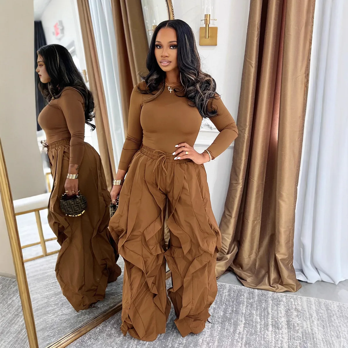 Women Fashion Solid Color Long Sleeve T-Shirt And Ruffled Stitching Wide Leg Pants Two-Piece Set