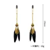 A Gold V Clip-Leaves And Feathers