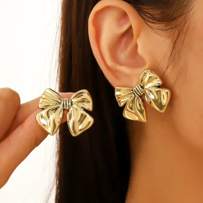 Women Fashion Exaggerated Metal Imitation Pearl Bowknot Earrings