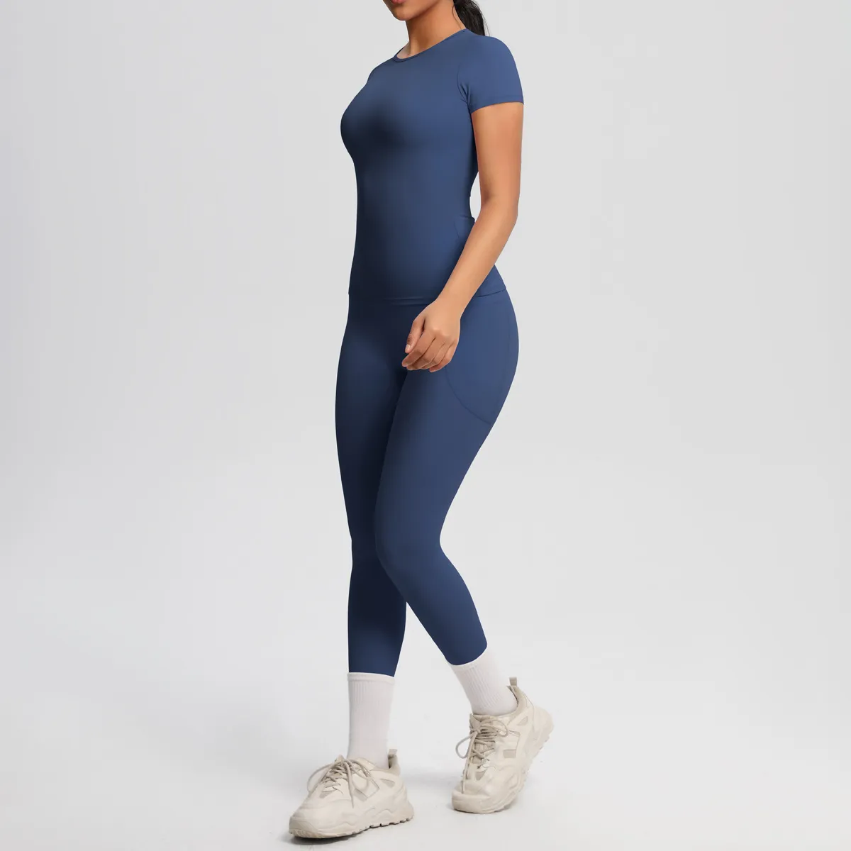 Women's Casual Yoga Two-Piece Set - Solid Color Short-Sleeve T-Shirt with Pockets and Leg-Bundled Pants