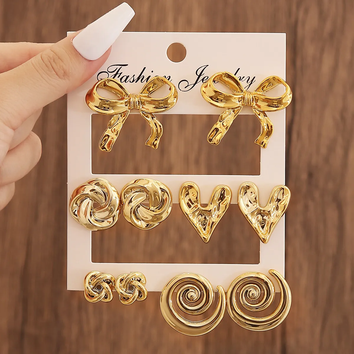 Women Fashion Exaggerated Geometric Hollow Love Bowknot Earrings Set