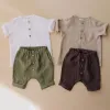 Left White Top Green Shorts