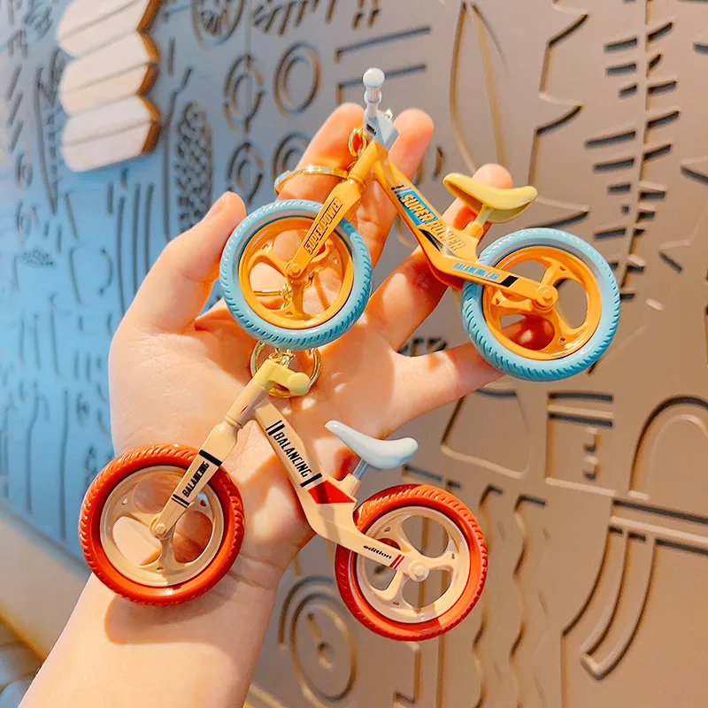 Creative Moveable Sliding Bicycle Keychain Plastic Cartoon Jewelry Keychain Fun Play Bag Keychain