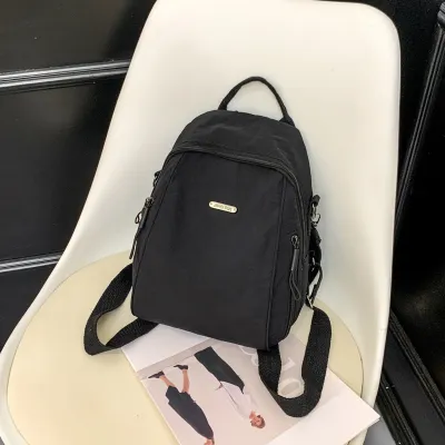 Women Solid Color Simple Large Capacity Travel Backpack in Nylon