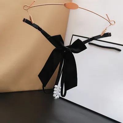 Women Fashion Sexy Solid Color Bowknot Beads Hollow Thong
