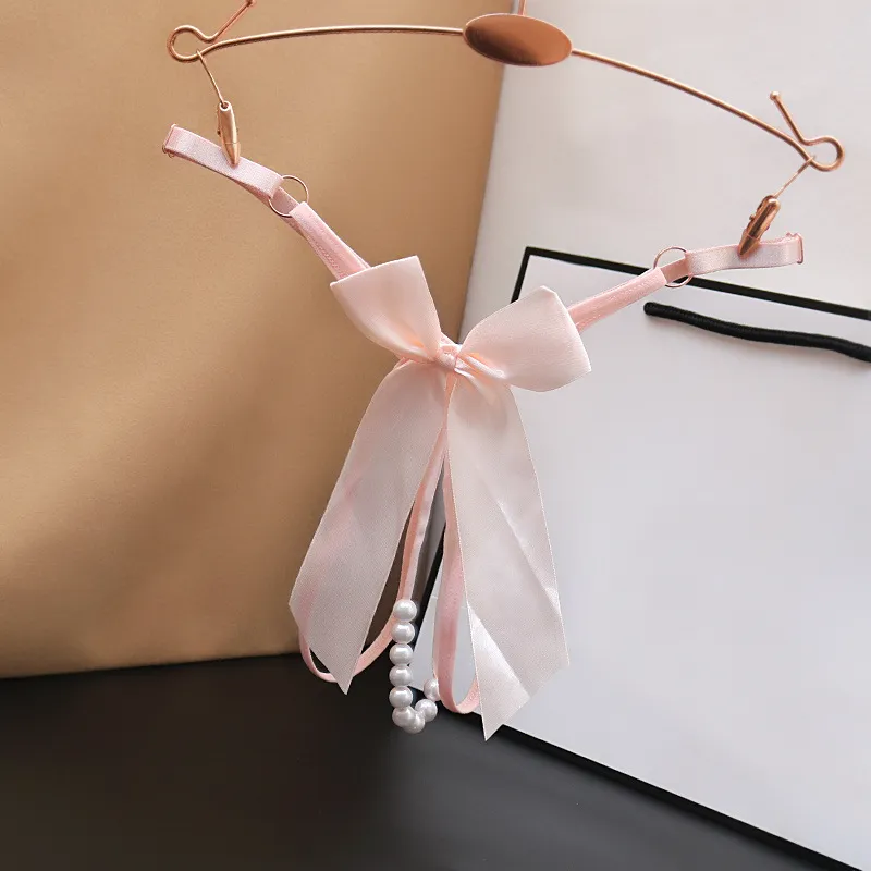 Women Fashion Sexy Solid Color Bowknot Beads Hollow Thong