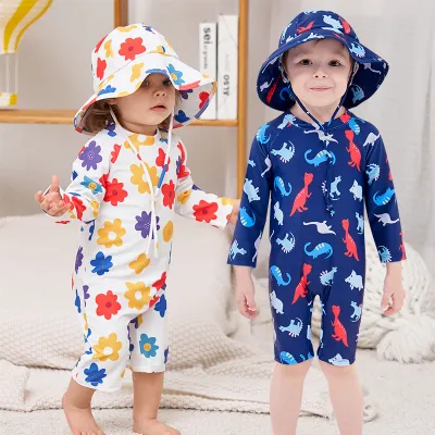 Conjunto de dos piezas de baño y gorro con estampado de dinosaurios para bebés, niños y niñas, de secado rápido.