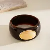 Brown-Off-White Round