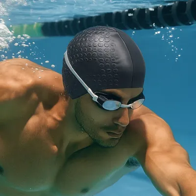 Bonnet de bain en silicone uni, tendance et antidérapant, haute élasticité, avec protection des oreilles.