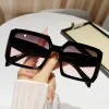 Black Frame Upper Gray Pink Lenses