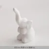 White Sitting Elephant