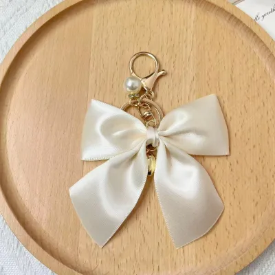Women Fashion Creative Solid Color Ribbon Pearl Bow Bag Pendant Keychain
