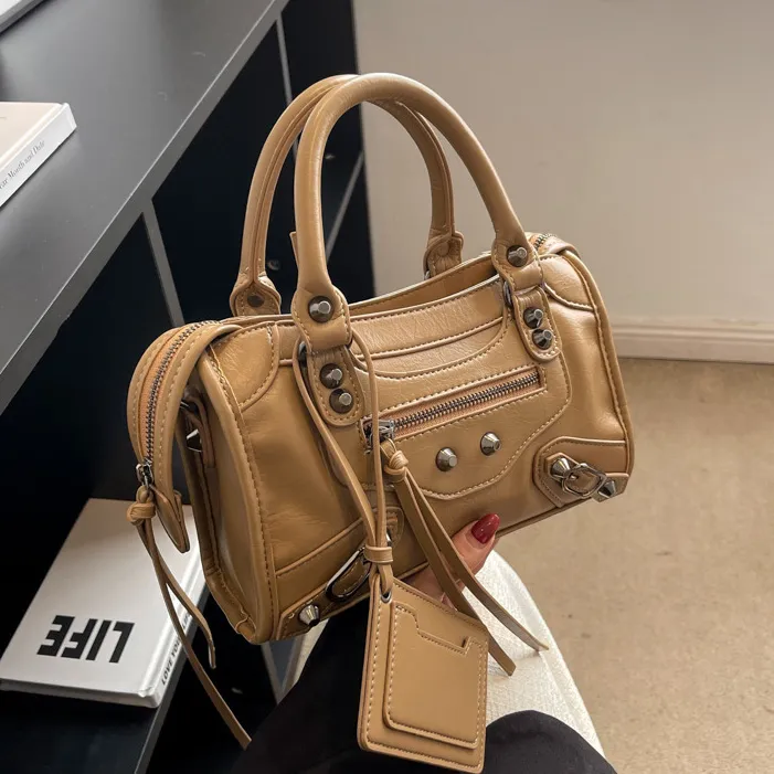 Women Fashion Casual Retro Solid Color Rivet Pillow Handbag
