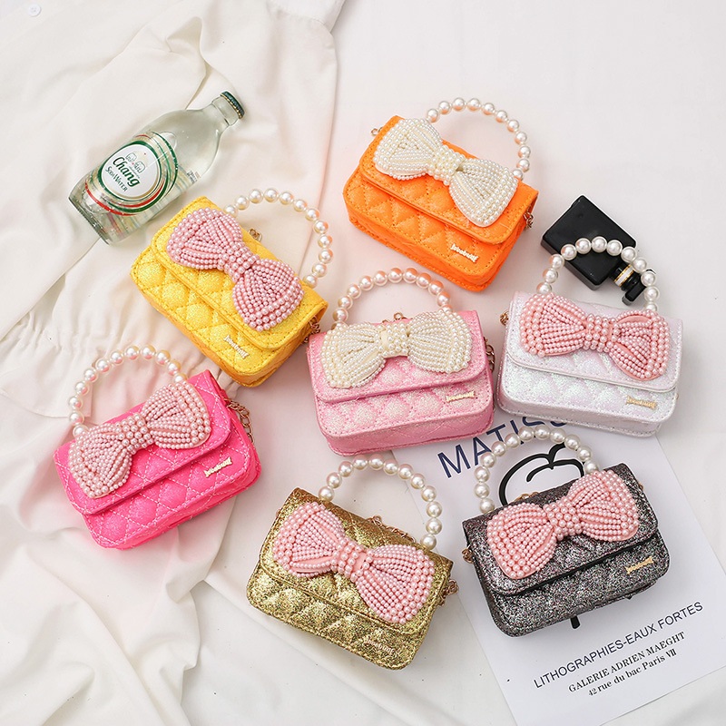 Wholesale Kids Girls Cute Pearl Bowknot Metal Chain Crossbody Bag