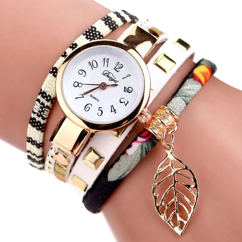 Women Luxury Metal Leaf Pendant Bracelet Quartz Watch Fabric Strap 22mm
