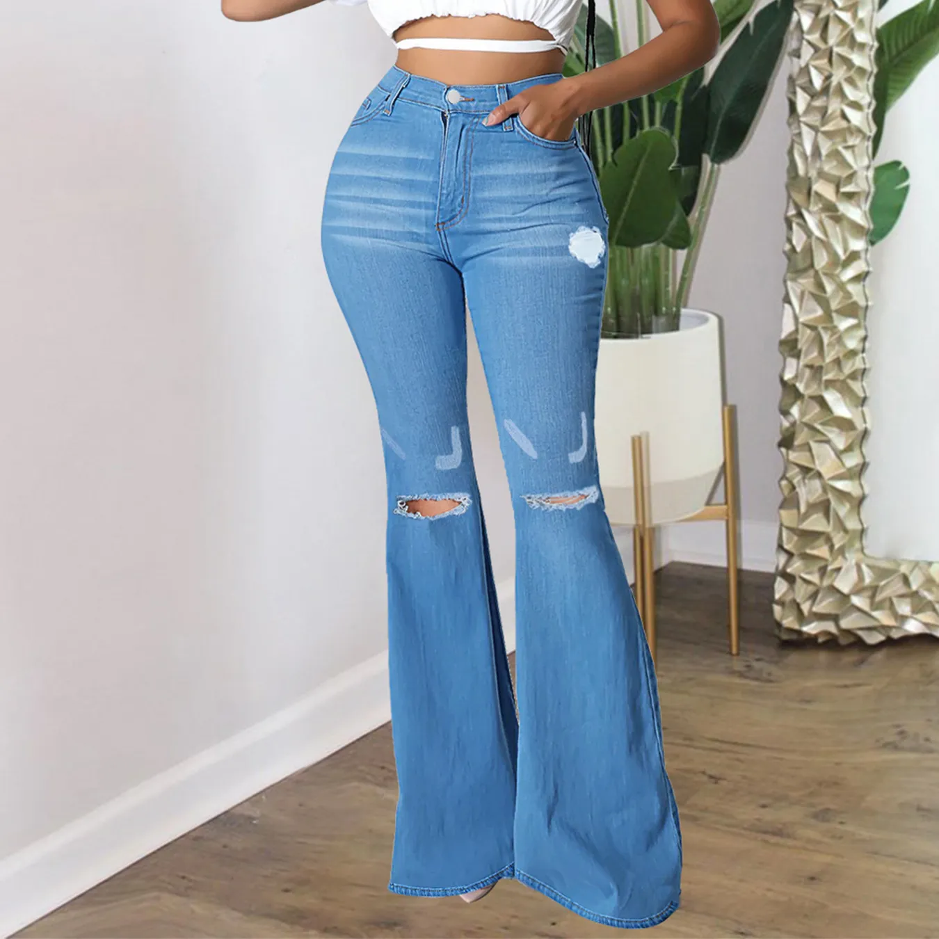 Wholesale Women Elegant Edgy Ripped Flared Jeans