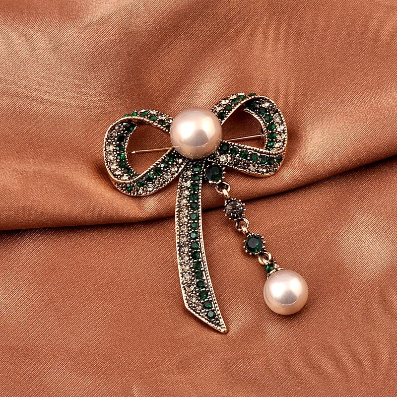 Wholesale Women Fashion Temperament Bow Pearl Brooch