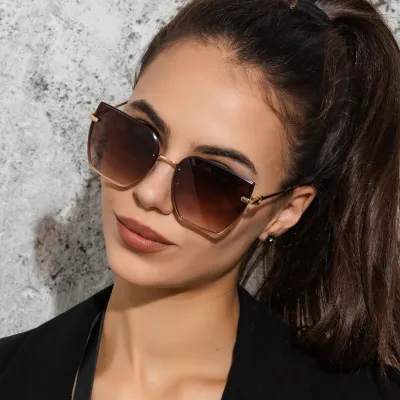 Women Fashion Frameless UV400 Cat Eye Sunglasses Metal PC Lens