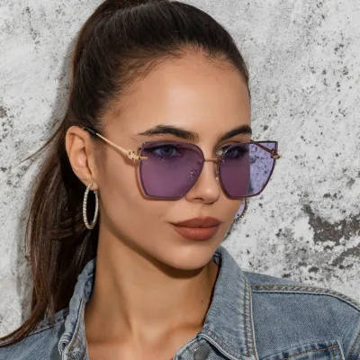 Women Fashion Frameless UV400 Cat Eye Sunglasses Metal PC Lens