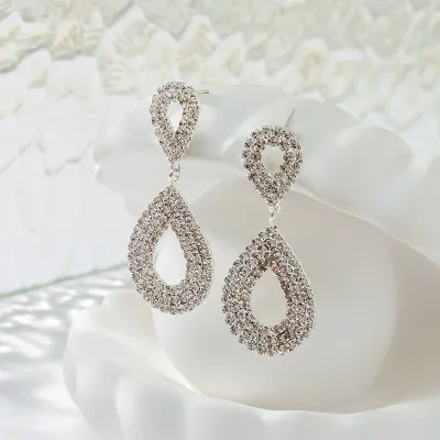 Venta al por mayor Pendientes colgantes de diamantes de imitación con forma de gota de agua simple a la moda para mujer