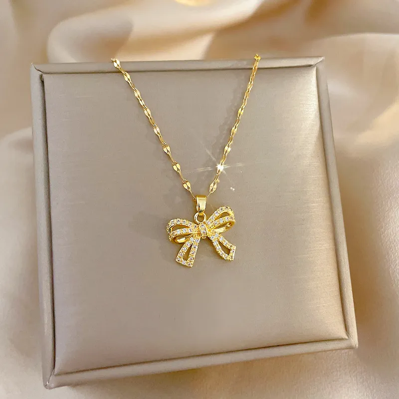 Wholesale Women Simple Rhinestone Bow Pendant Titanium Steel Necklace