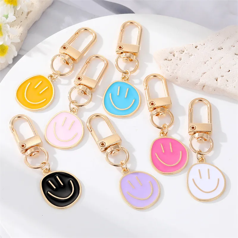 Women Cute Alloy Drip Oil Smiley Irregular Expression Bag Pendant Keychain