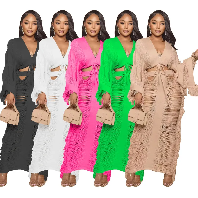 Women Fashion Solid Color Knitted Hollow Long-Sleeved Top And Short Skirt Two-Piece Set