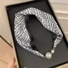 20-E Letter Black Edge (Pearl Necklace Silk Scarf)