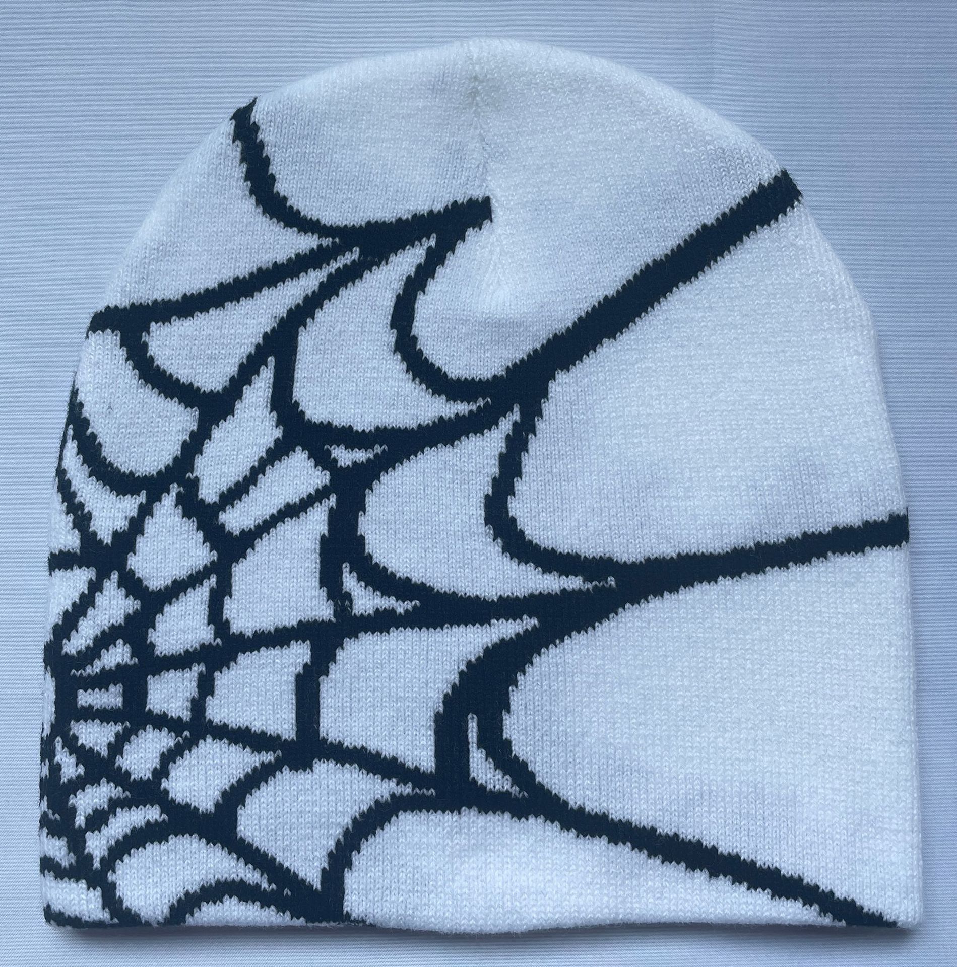 Wholesale Fashion Outdoor Riding Spider Web Jacquard Knitted Hat
