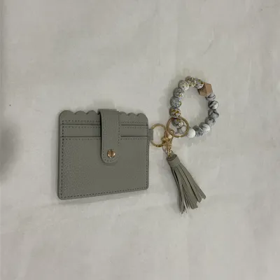 Women's Fashion Bohemian Tassel Bracelet Compact Wallet PU Leather Geometric