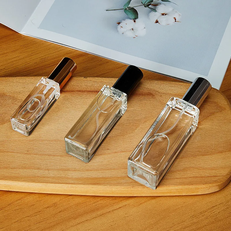 Wholesale Transparent Thickened Glass Perfume Press Spray Refillable Bottle