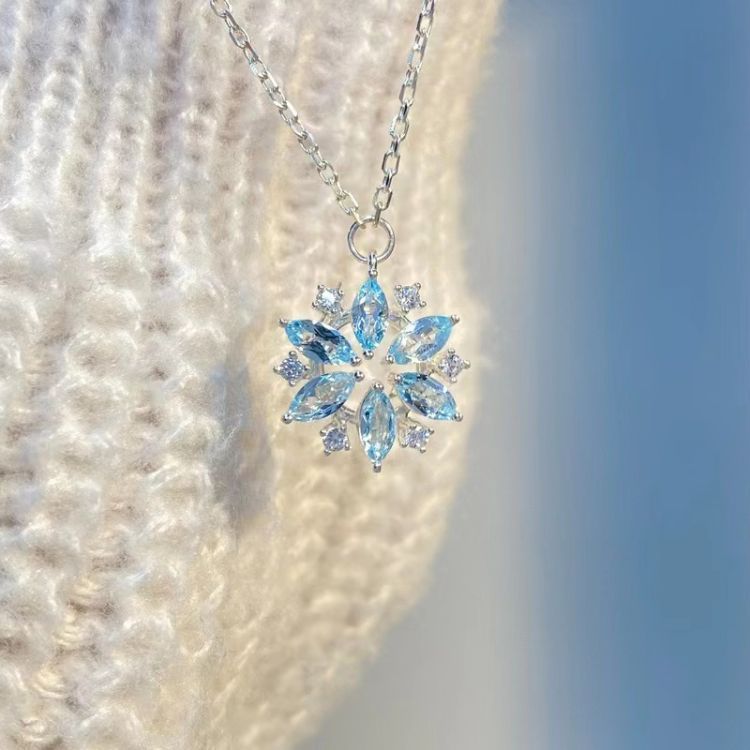 Blue snowflake necklace hotsell