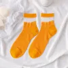A Pair Of Orange In The Tube