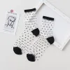 A Pair Of Black Spots