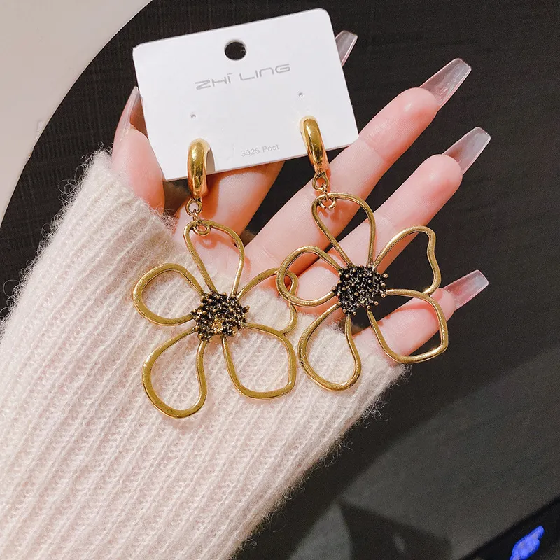 Creative Personality Hollow Floral Alloy Earrings