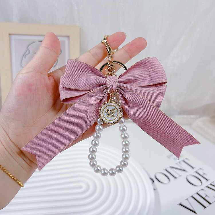 Wholesale Women Fashion Exaggerated Bow Pearl Chain Keychain