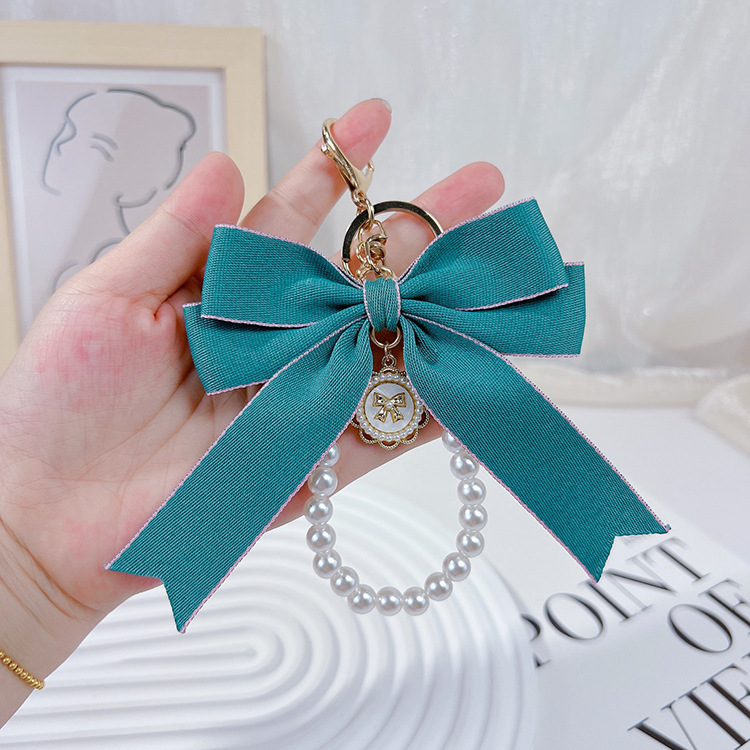 Wholesale Women Fashion Exaggerated Bow Pearl Chain Keychain