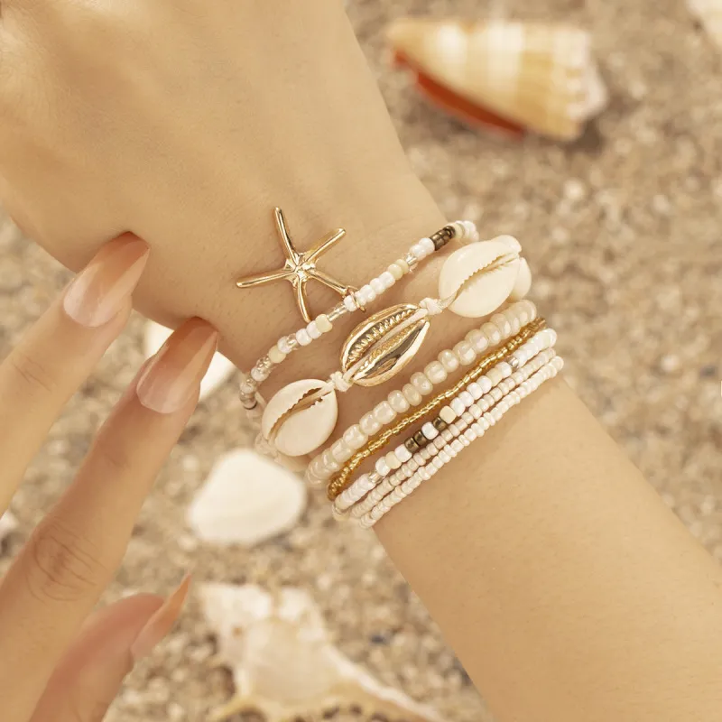 Women's Leisure Holiday Beach Starfish Shell Rice Beads Multi-Layer Beaded Bracelet Set