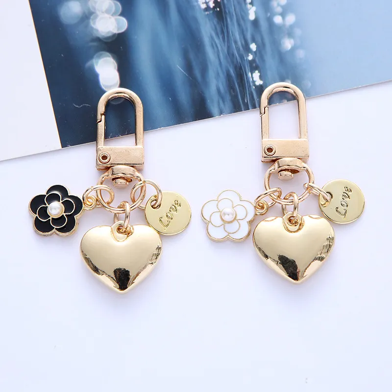 Women Fashion Creative Heart-Shaped Camellia Pearl Letter Metal Accessories Keychain Pendant