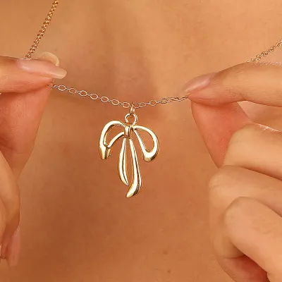 Women Simple Fashion Metal Bow Pendant Necklace