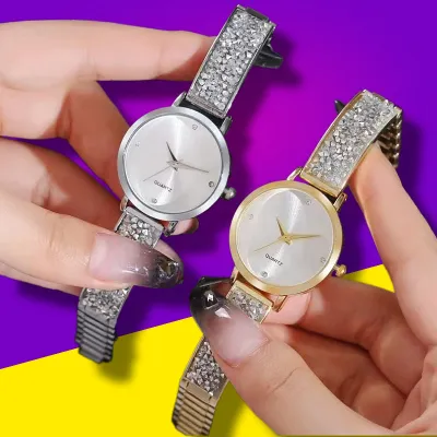 Reloj de cuarzo con banda de acero y diamantes de imitación con esfera redonda a la moda para mujer